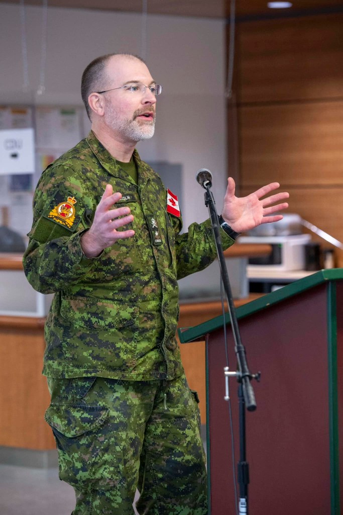 2 Field Ambulance special guest Brigadier-General Scott Malcolm speaks in honour of Lieutenant-Colonel Erin Savage at Garrison Petawawa on 04 December 2023. Photo credit: Corporal Melissa Michaud, Garrison Petawawa Imaging